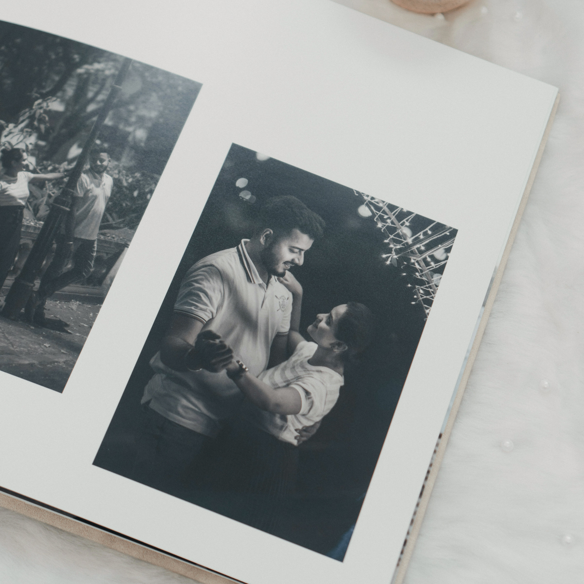 Open photo album on a wedding table