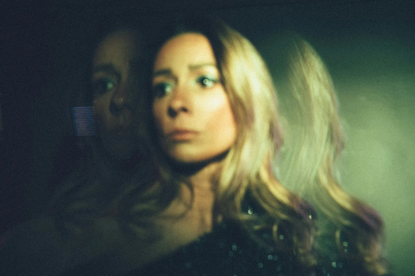 Double exposure Halloween photo with a see-through ghostly figure